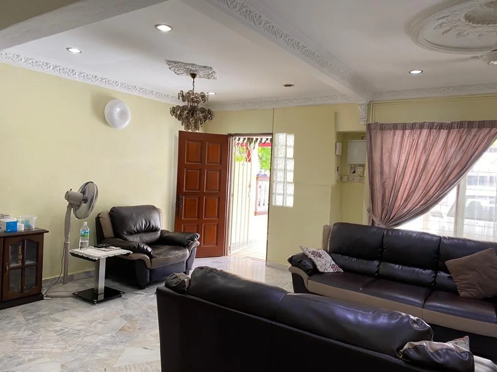 Living room & main entrance of the Medan Batu Caves home