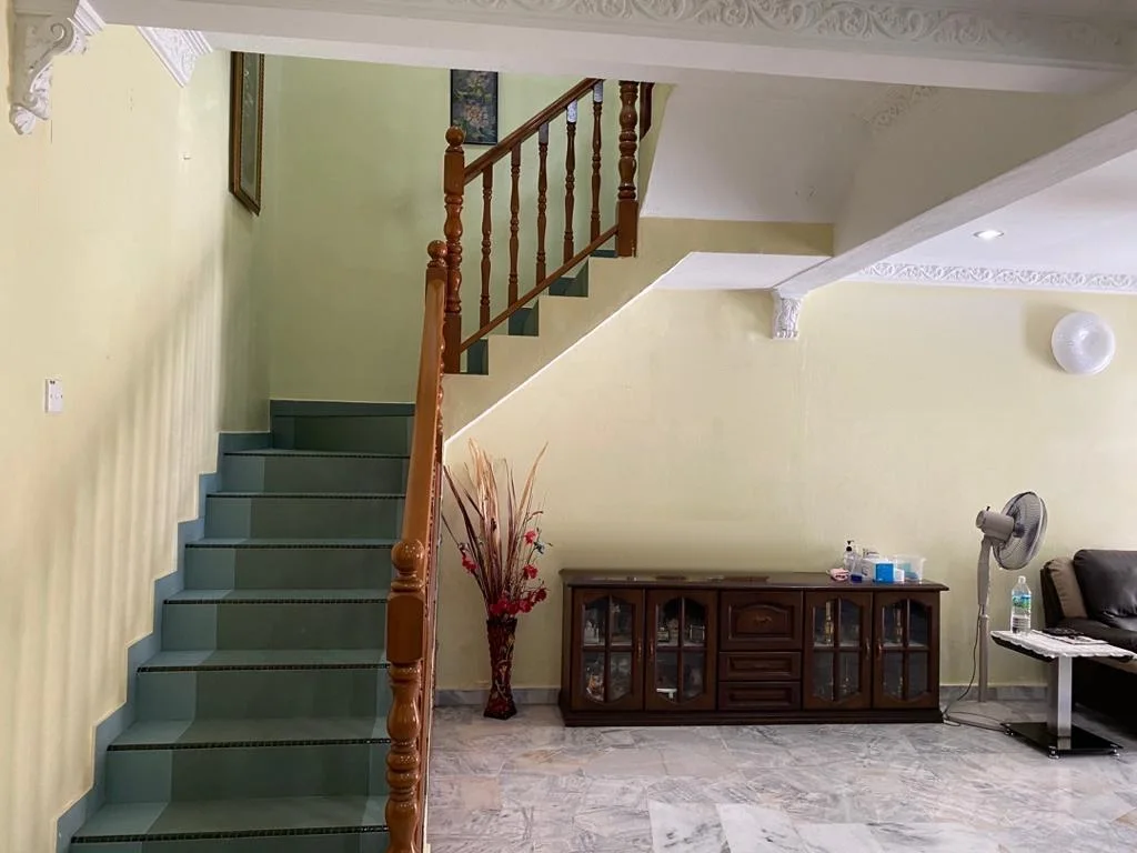 Hall & timber staircase of the Medan Batu Caves home